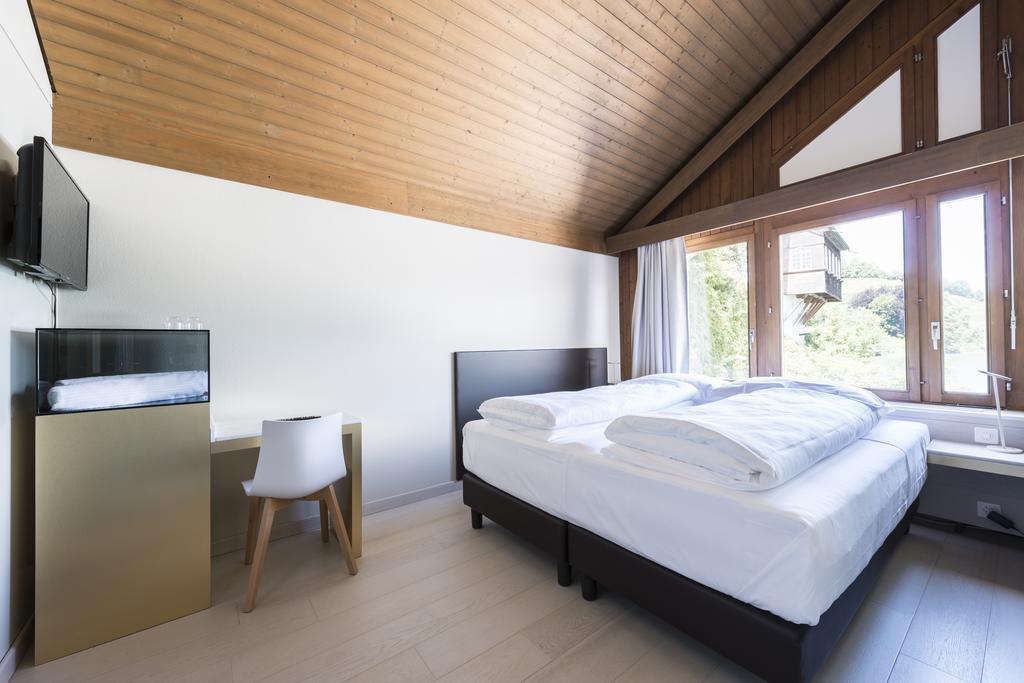 Boutique Hotel Riviera Spiez Pokoj fotografie